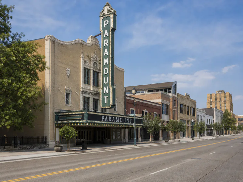 Historic Paramount Theatre facade and vertical sign in Aurora