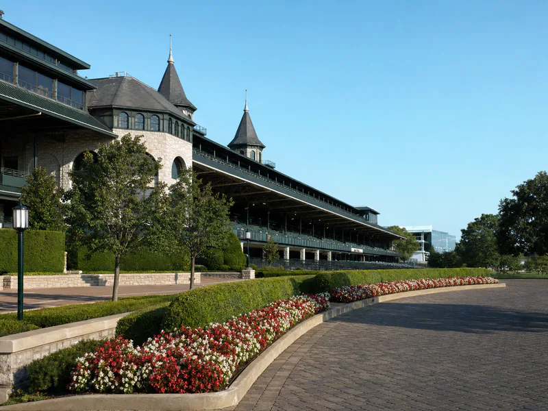 Historic Keeneland grandstand and landscaped approach in Lexington