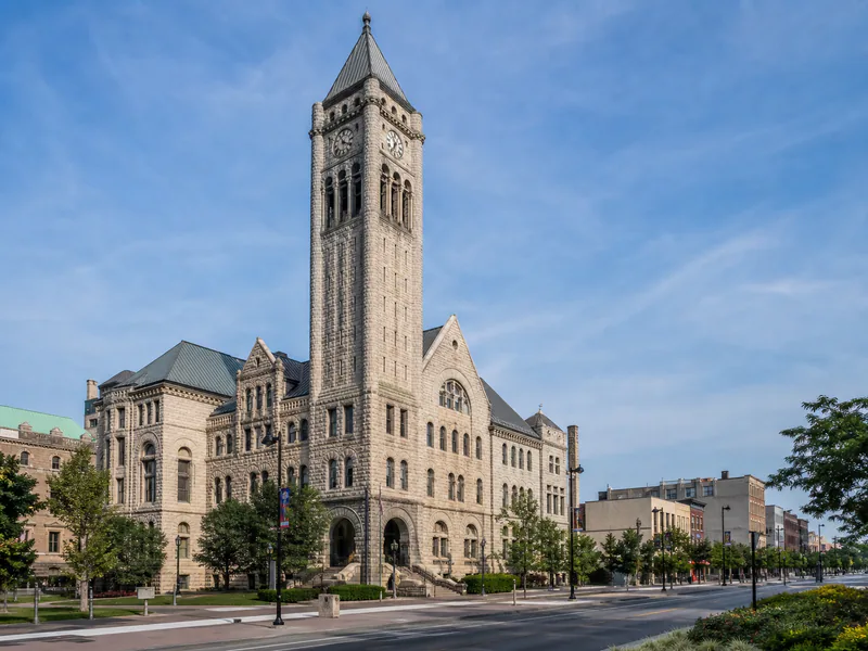 Romanesque stone tower and facade of Syracuse City Hall