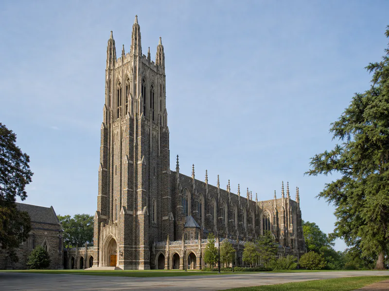 Stone tower and Gothic facade of Duke Chapel in Durham