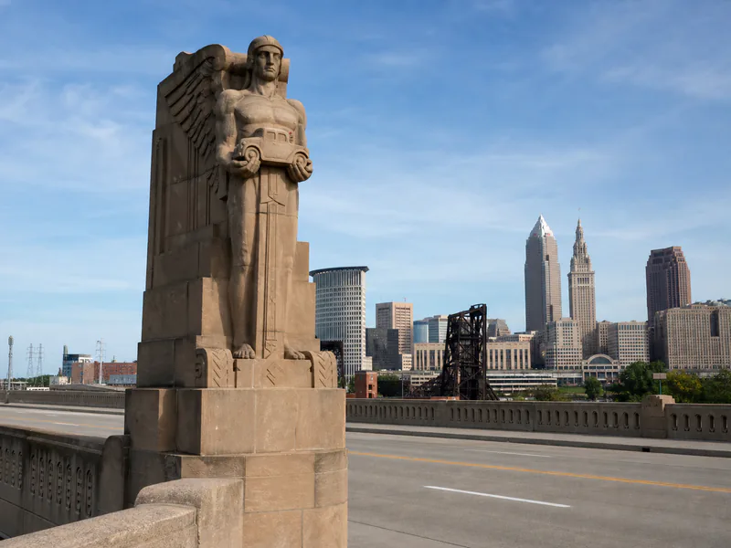 Guardian of Traffic on Hope Memorial Bridge with downtown Cleveland