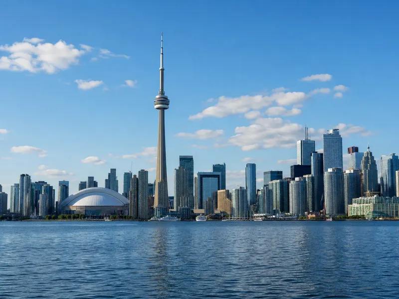 CN Tower and the downtown Toronto skyline viewed across Lake Ontario in clear daylight