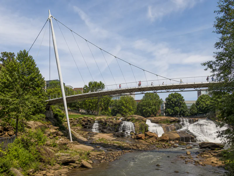 Liberty Bridge over the waterfalls at Falls Park on the Reedy in Greenville