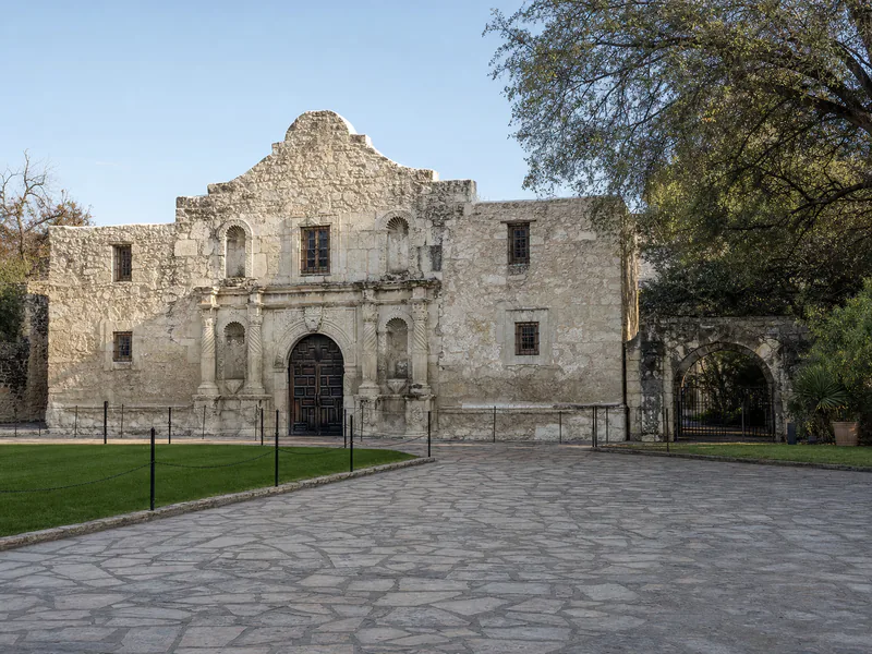 Historic church facade and courtyard of the Alamo in San Antonio